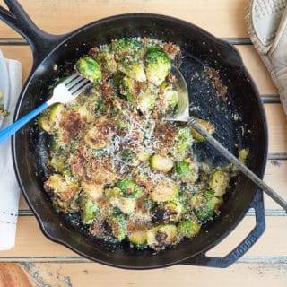 Bacon Brussels Sprouts with Garlic Parmesan Cream Sauce in Cast Iron Skillet