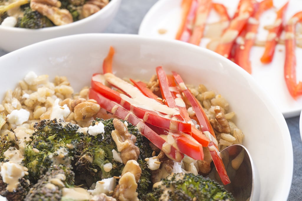 vegetarian buddha bowl with roasted broccoli and walnuts