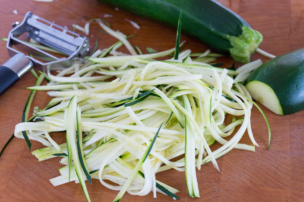 Zucchini Noodles on cutting board