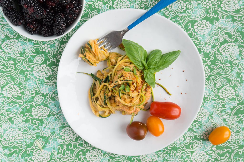 Zucchini Noodles overhead coated with Vegan Tomato Sauce