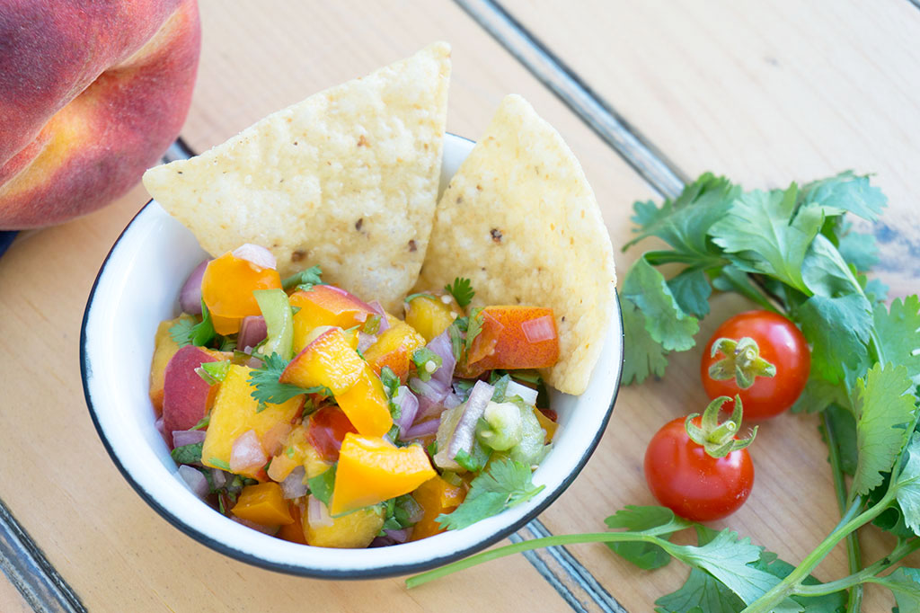 peach Salsa in a bowl with chips