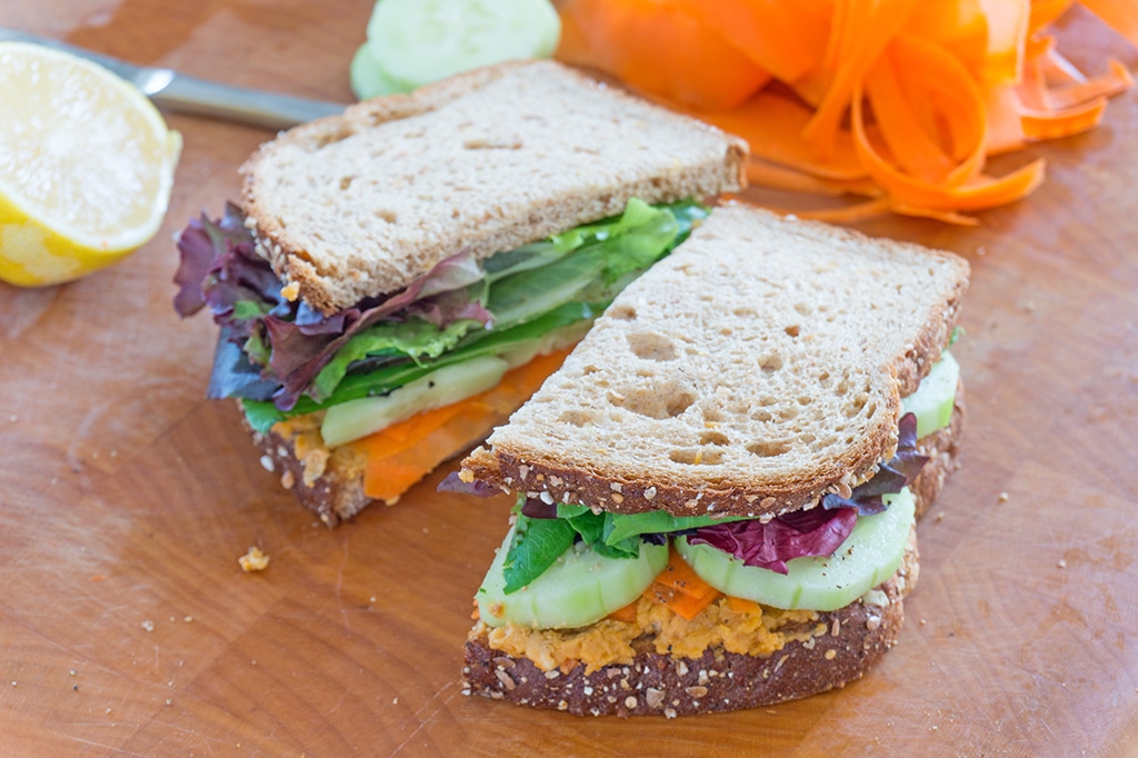 Roasted Chickpeas Veggie Sandwich sliced in two halves