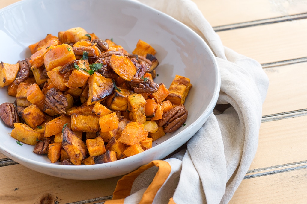 Roasted Sweet Potatoes with Apple Brandied Coconut Pecans - in bowl