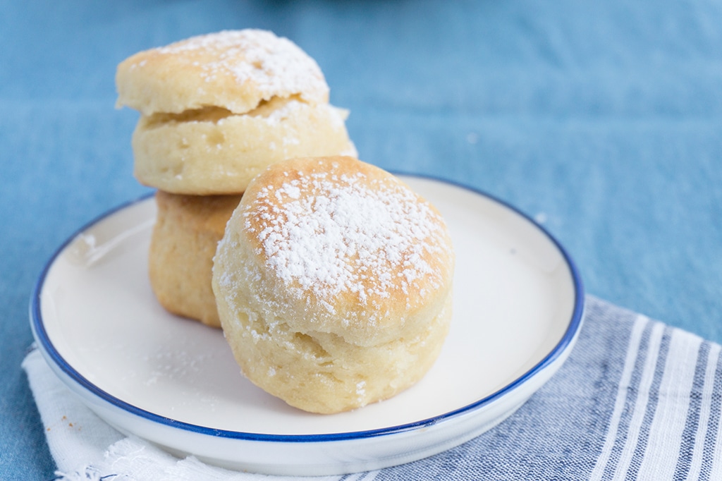 biscuits on a plate sliced with butter