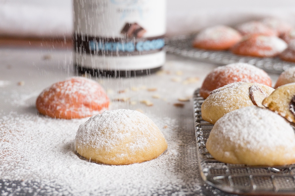 dusting cookies with powdered sugar