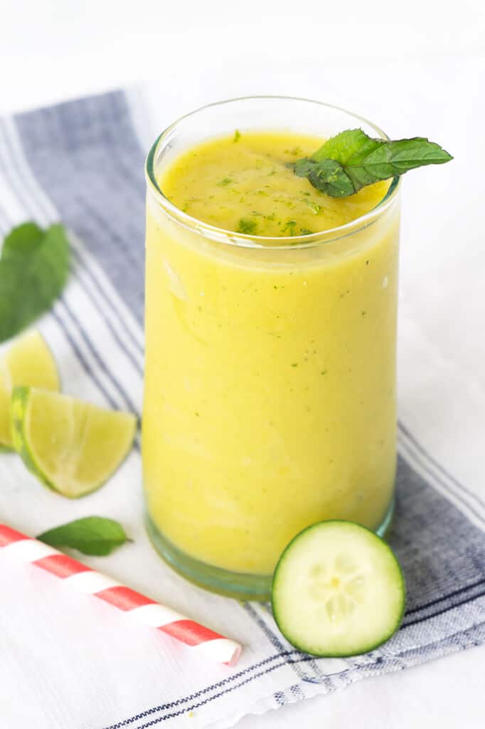 Cucumber water is SO refreshing. That is true for cucumber smoothies too! This Mango Cucumber Mint Smoothie is light and refreshing and perfectly sweet without the addition of sweeteners. It's what a healthy smoothie should be! | SMOOTHIES | CUCUMBER | MANGO | VEGAN | Recipe at OatandSesame.com
