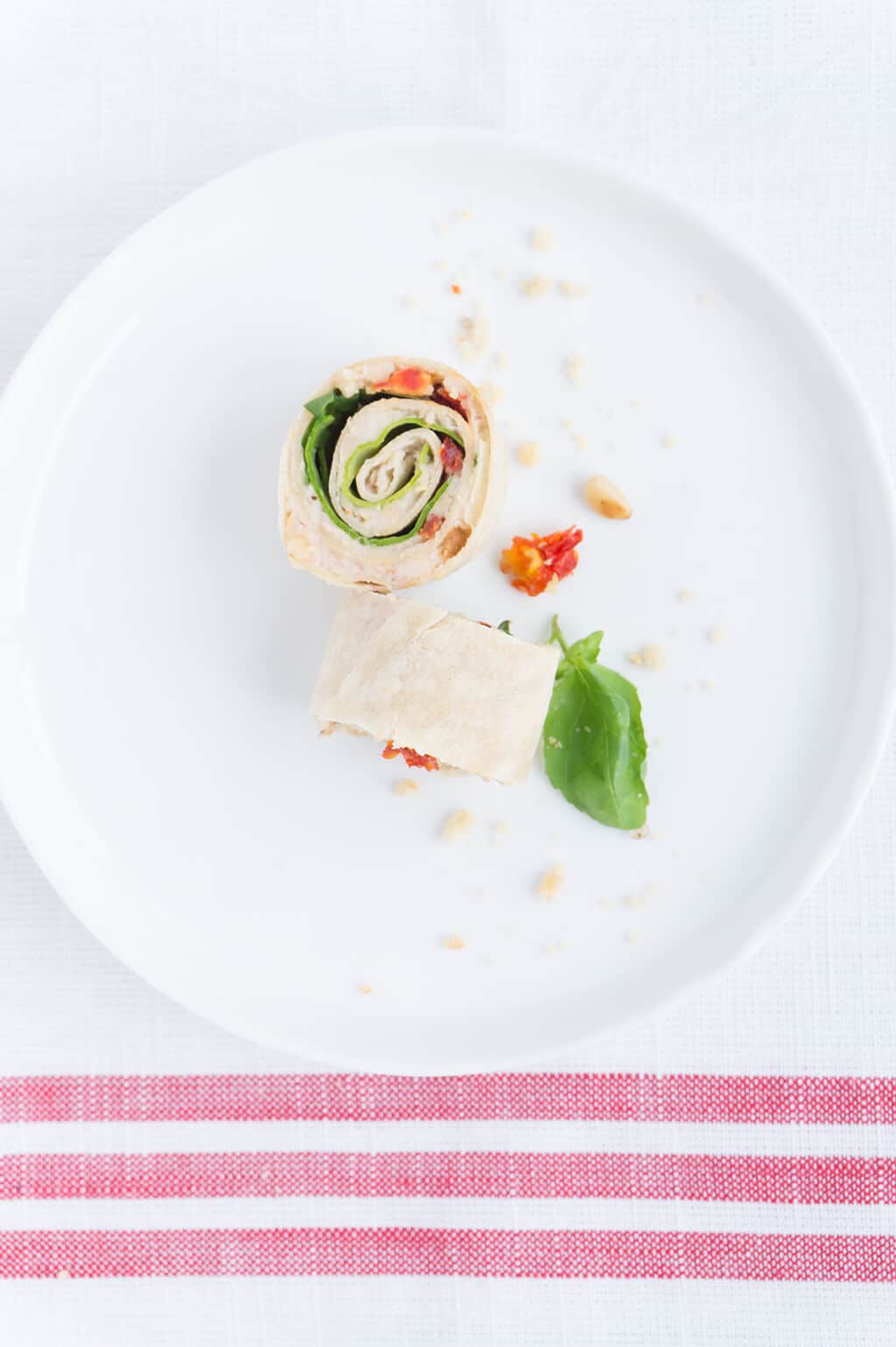 Sun-Dried Tomato, Basil and Spinach Pinwheels on plate