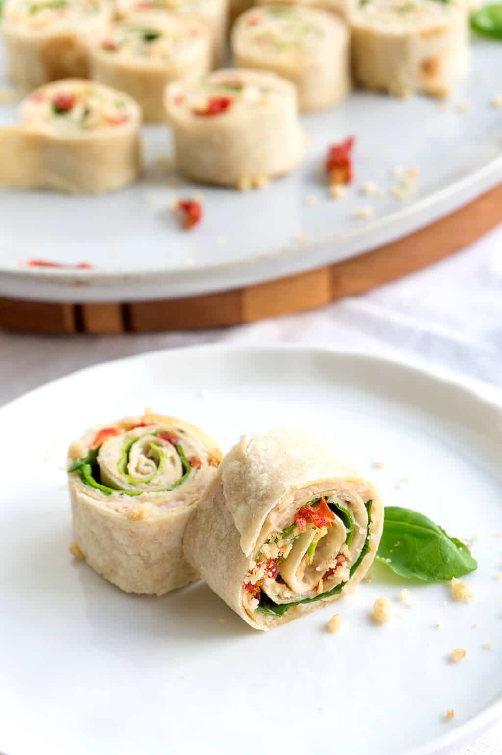 Sun-Dried Tomato, Basil and Spinach Pinwheels on plate