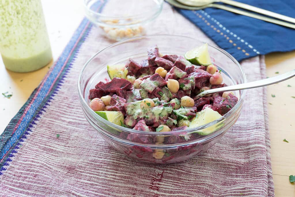 Beet & Chickpea Salad with Coconut Lime Dressing in small bowl