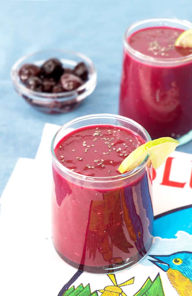 Cherry Lime Beet Smoothie vertical image with 2 glasses