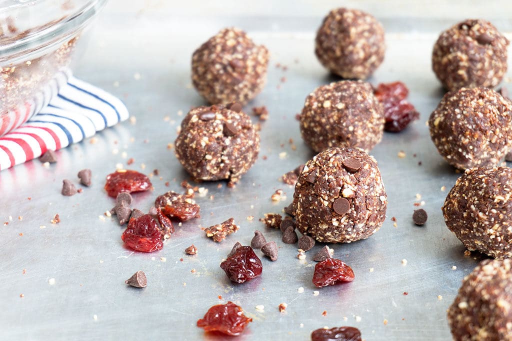 Cherry Chocolate Energy Balls rolled on cookie sheet