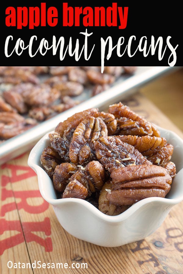 apple brandy pecans in small white dish