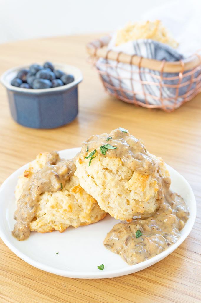 biscuits and gravy on a plate vertical image