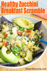 Layers of onions, peppers, zucchini and blue corn chips are tossed with eggs and spices for the ultimate Southwestern inspired breakfast bowl. | #BREAKFASTIdeas | #MIGAS | #ZUCCHINIRecipes | #HealthyRecipes at OatandSesame.com #oatandsesame